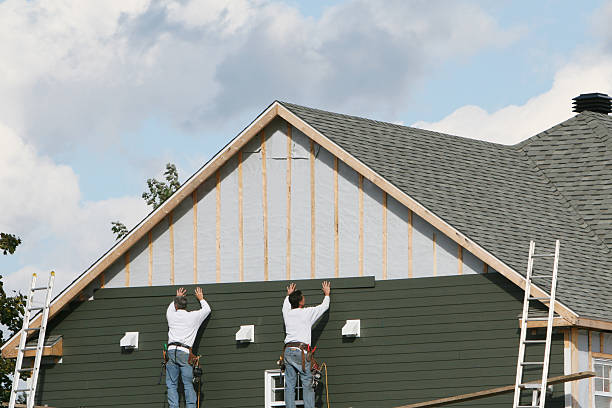 Professional Siding Installation technician working in Auburndale, FL